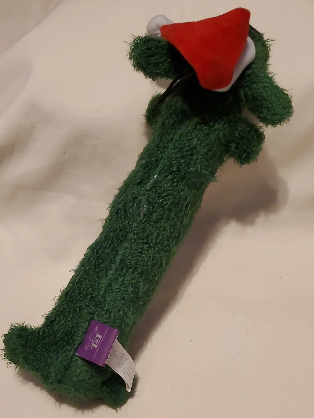 Green Loofa Dog Toy with Santa Hat